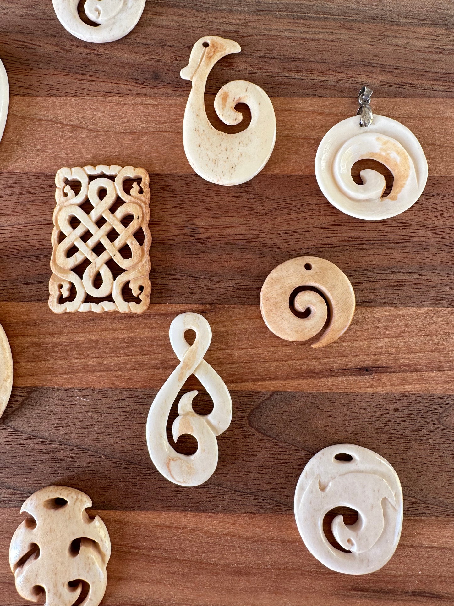 Hand Carved Ox Bone Pendants