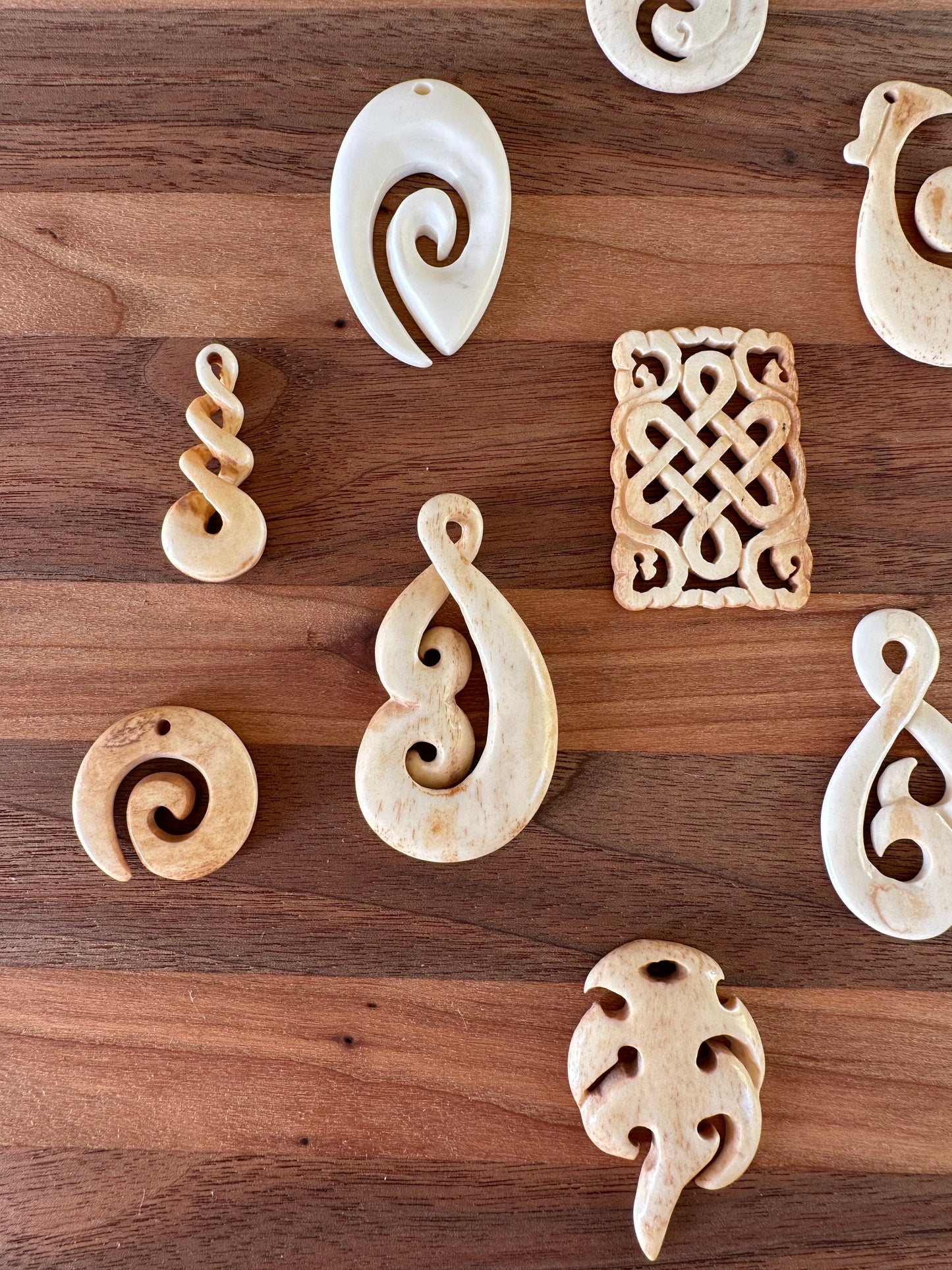 Hand Carved Ox Bone Pendants