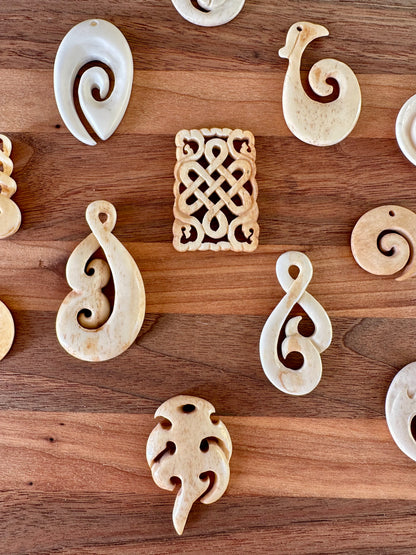 Hand Carved Ox Bone Pendants