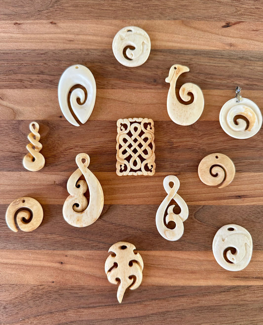 Hand Carved Ox Bone Pendants